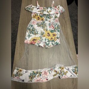 Girls shorts romper with long built in tulle skirt covering.